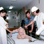  Alexandra Auder, Brian Fitzpatrick, and Kevin Van Hentenryck check Belial's condition.