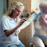 Barbara Anne Bock prepares the dummy of Susan Napoli. 