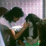 Gino Crognale paints the face of the Kimberly Taylor dummy. 