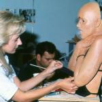 Barbara Anne Bock dresses the dummy of Sandi Colosimo. 