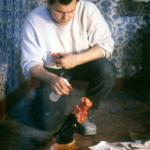 Gabe Bartalos moistens David Lipman's severed foot. 