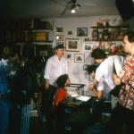 Peter Clark behind camera while FH confers with art staff.