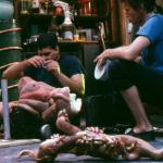 Gabe Bartalos prepares the "titty-twister" creature as one of the puppeteer's looks on. 