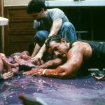 Billy Messina positions one of the creatures as everything is bathed in purple goop. 